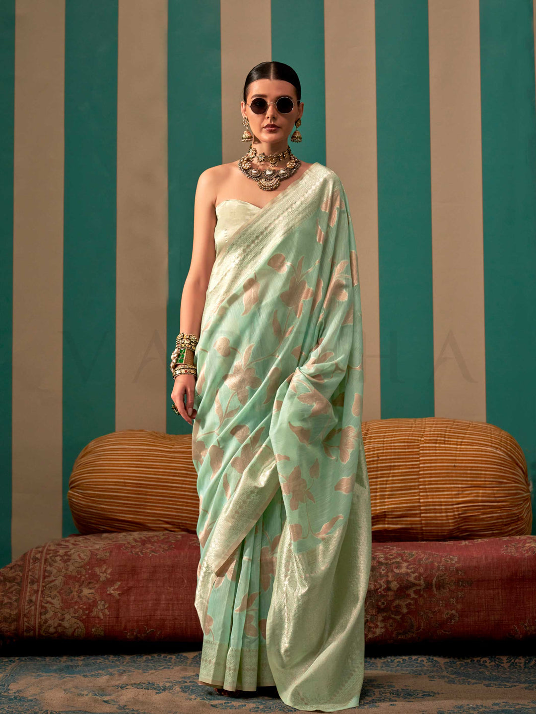 Aqua Green and Cream linen saree with floral woven motifs and soft handloom texture This image captures the front drape view highlighting pallu fall and pleats alignment, ideal for visualizing festive elegance, designer appeal, and modern styling inspiration. Perfect for online shoppers seeking detailed previews before purchase, enhancing saree visual merchandising and SEO-rich product display strategy.                                                                                                          