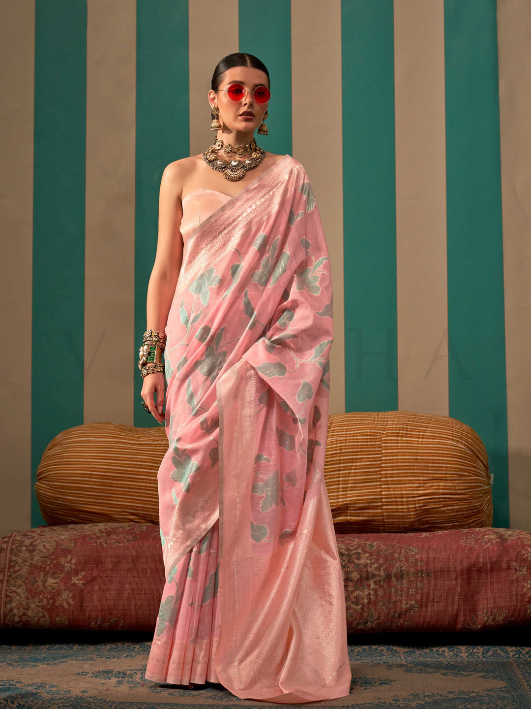 Baby Pink and Sky Blue linen saree with floral woven motifs and soft handloom texture This image captures the front drape view highlighting pallu fall and pleats alignment, ideal for visualizing festive elegance, designer appeal, and modern styling inspiration. Perfect for online shoppers seeking detailed previews before purchase, enhancing saree visual merchandising and SEO-rich product display strategy.                                                                                                        