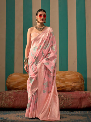 Baby Pink and Sky Blue linen saree with floral woven motifs and soft handloom texture This image captures the front drape view highlighting pallu fall and pleats alignment, ideal for visualizing festive elegance, designer appeal, and modern styling inspiration. Perfect for online shoppers seeking detailed previews before purchase, enhancing saree visual merchandising and SEO-rich product display strategy.                                                                                                        