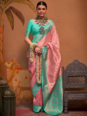 Pink and Sea Green striped silk saree with handloom weave and checked pallu. Ideal for wedding functions like reception look, styled with heritage jewelry and temple-inspired accessories. This image captures the front drape view highlighting pallu fall and pleats alignment, ideal for visualizing festive elegance, designer appeal, and modern styling inspiration. Perfect for online shoppers seeking detailed previews before purchase, enhancing saree visual merchandising and SEO-rich product display strategy.  