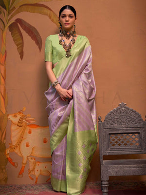 Lavender and Pista Green striped silk saree with handloom weave and checked pallu. Ideal for sangeet functions like sister of bride, styled with heritage jewelry and temple-inspired accessories. This image captures the front drape view highlighting pallu fall and pleats alignment, ideal for visualizing festive elegance, designer appeal, and modern styling inspiration. Perfect for online shoppers seeking detailed previews before purchase, enhancing saree visual merchandising and SEO-rich product display stra