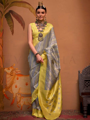 Lemon Yellow and Grey striped silk saree with handloom weave and checked pallu. Ideal for bollywood functions like editorial fashion, styled with heritage jewelry and temple-inspired accessories. This image captures the front drape view highlighting pallu fall and pleats alignment, ideal for visualizing festive elegance, designer appeal, and modern styling inspiration. Perfect for online shoppers seeking detailed previews before purchase, enhancing saree visual merchandising and SEO-rich product display str