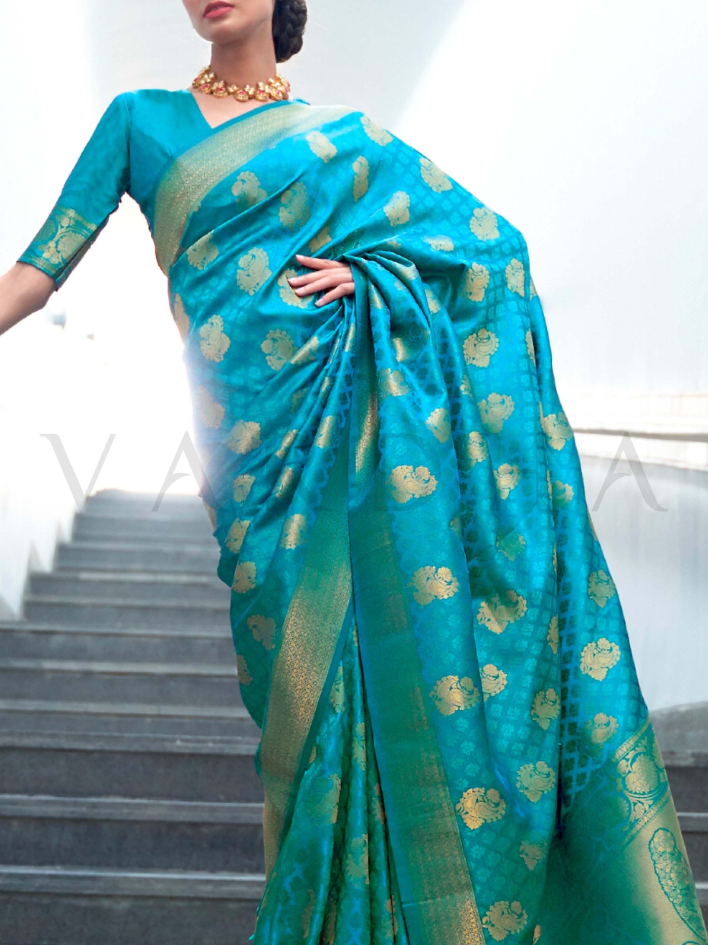 This Teal Green–Gold Satin Silk saree is crafted with intricate woven zari accents, ideal for receptions, festive wear, and ethnic elegance. A timeless drape with regal charm. SKU 179003. This Teal Green–Gold Satin Silk saree is crafted with intricate woven zari accents, ideal for receptions, festive wear, and ethnic elegance. A timeless drape with regal charm. SKU 179003.