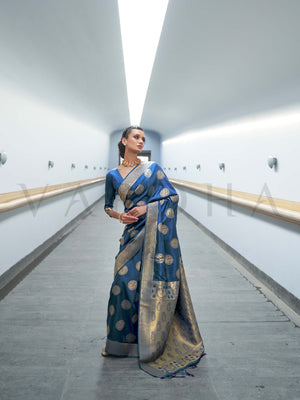 This Ink Blue–Beige Satin Silk saree is crafted with intricate woven zari accents, ideal for receptions, festive wear, and ethnic elegance. A timeless drape with regal charm. SKU 179005. This Ink Blue–Beige Satin Silk saree is crafted with intricate woven zari accents, ideal for receptions, festive wear, and ethnic elegance. A timeless drape with regal charm. SKU 179005.