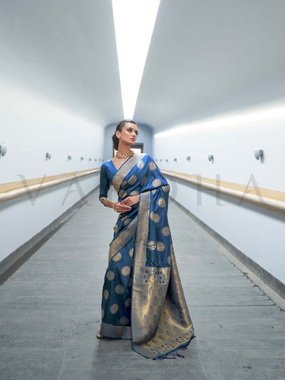 This Ink Blue–Beige Satin Silk saree is crafted with intricate woven zari accents, ideal for receptions, festive wear, and ethnic elegance. A timeless drape with regal charm. SKU 179005. This Ink Blue–Beige Satin Silk saree is crafted with intricate woven zari accents, ideal for receptions, festive wear, and ethnic elegance. A timeless drape with regal charm. SKU 179005.