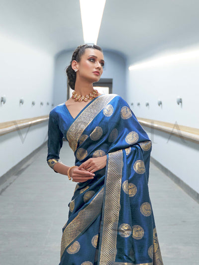 This Ink Blue–Beige Satin Silk saree is crafted with intricate woven zari accents, ideal for receptions, festive wear, and ethnic elegance. A timeless drape with regal charm. SKU 179005. This Ink Blue–Beige Satin Silk saree is crafted with intricate woven zari accents, ideal for receptions, festive wear, and ethnic elegance. A timeless drape with regal charm. SKU 179005.