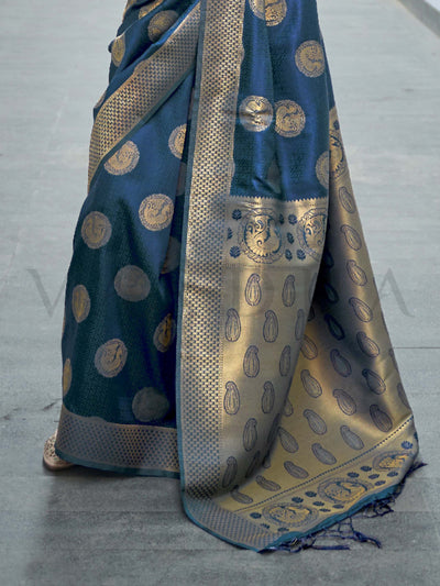 This Ink Blue–Beige Satin Silk saree is crafted with intricate woven zari accents, ideal for receptions, festive wear, and ethnic elegance. A timeless drape with regal charm. SKU 179005. This Ink Blue–Beige Satin Silk saree is crafted with intricate woven zari accents, ideal for receptions, festive wear, and ethnic elegance. A timeless drape with regal charm. SKU 179005.