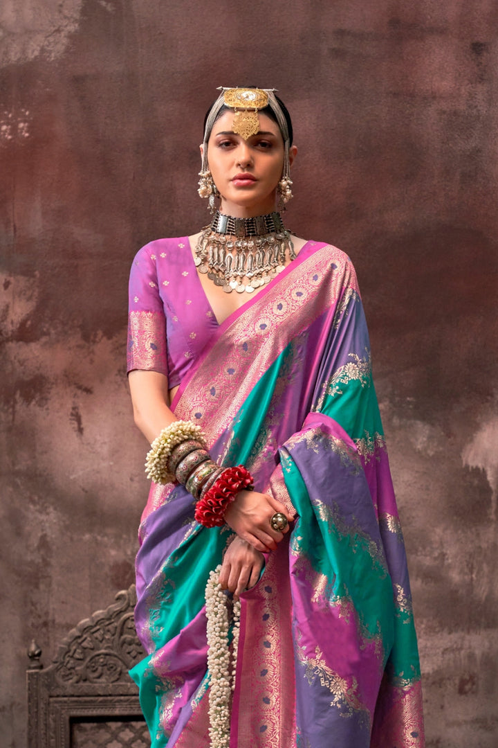 Purple and Aqua Blue Rangkaat silk saree with temple borders, intricate zari pallu, and traditional wedding styling. Handloom drape perfect for wedding functions and south indian muhurtham, styled with mogra, antique jewelry, and regal stance. This image captures the back drape focus revealing pallu finesse and motif richness, ideal for visualizing festive elegance, designer appeal, and modern styling inspiration. Perfect for online shoppers seeking detailed previews before purchase, enhancing saree visual 