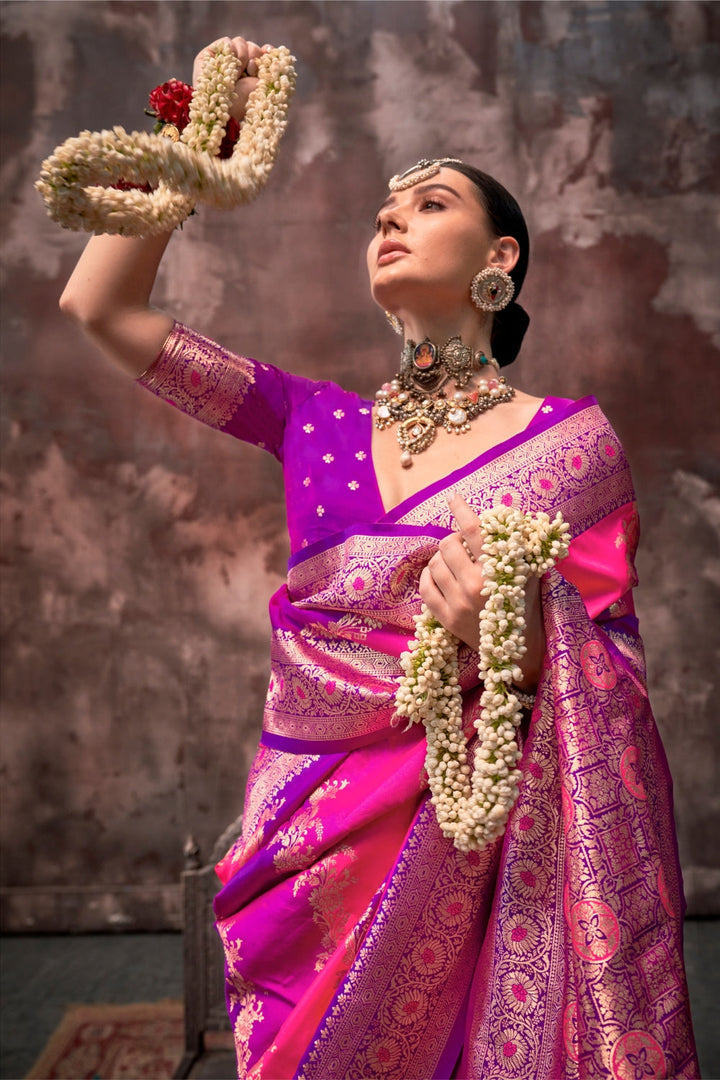 Rani Pink and Magenta Rangkaat silk saree with temple borders, intricate zari pallu, and traditional wedding styling. Handloom drape perfect for sangeet functions and bridal sangeet, styled with mogra, antique jewelry, and regal stance. This image captures the zoomed texture view illustrating fabric weave and print clarity, ideal for visualizing festive elegance, designer appeal, and modern styling inspiration. Perfect for online shoppers seeking detailed previews before purchase, enhancing saree visual mer