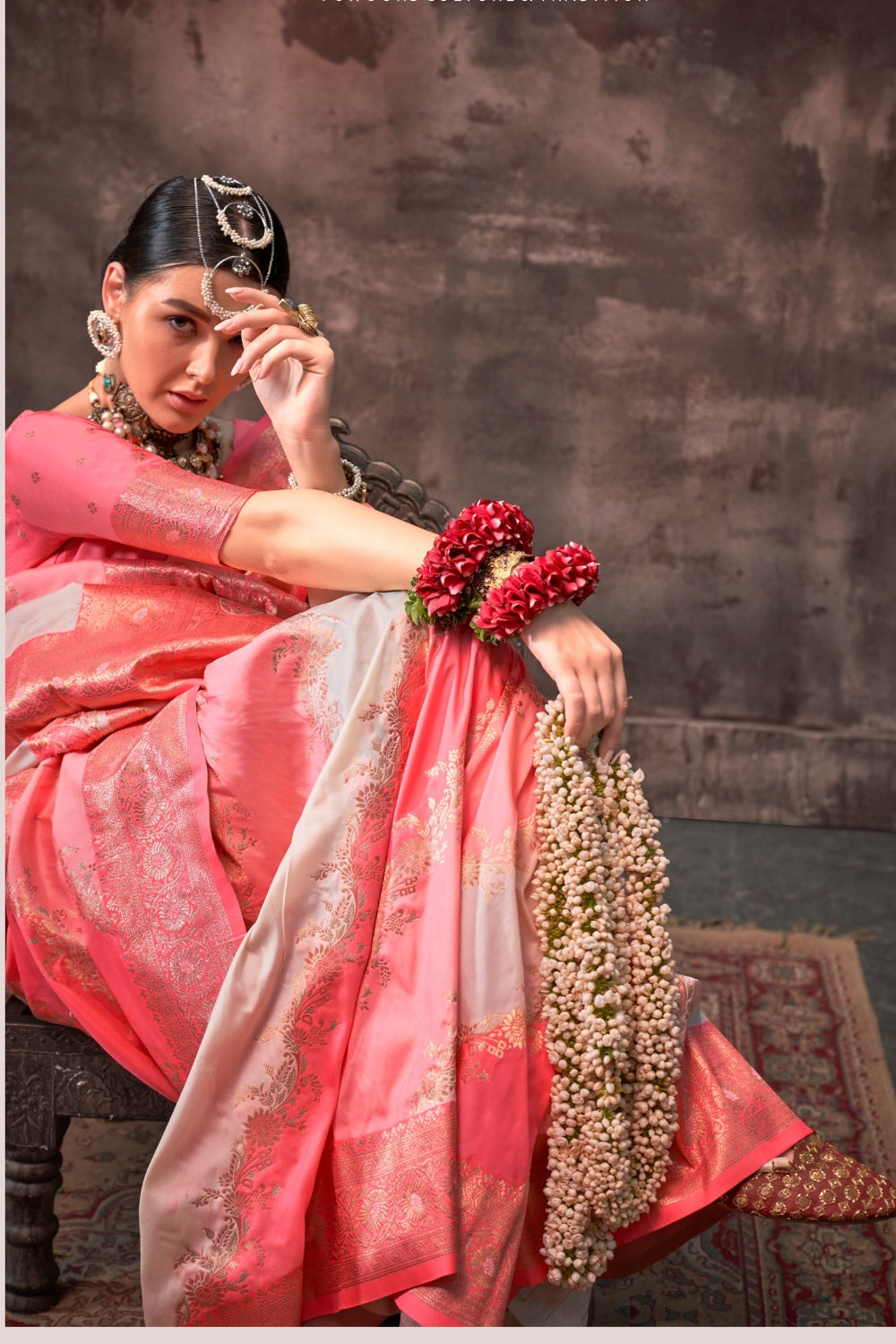 Blush Coral and Silver Rangkaat silk saree with temple borders, intricate zari pallu, and traditional wedding styling. Handloom drape perfect for festive season functions and karwachauth, diwali, styled with mogra, antique jewelry, and regal stance. This image captures the zoomed texture view illustrating fabric weave and print clarity, ideal for visualizing festive elegance, designer appeal, and modern styling inspiration. Perfect for online shoppers seeking detailed previews before purchase, enhancing sar