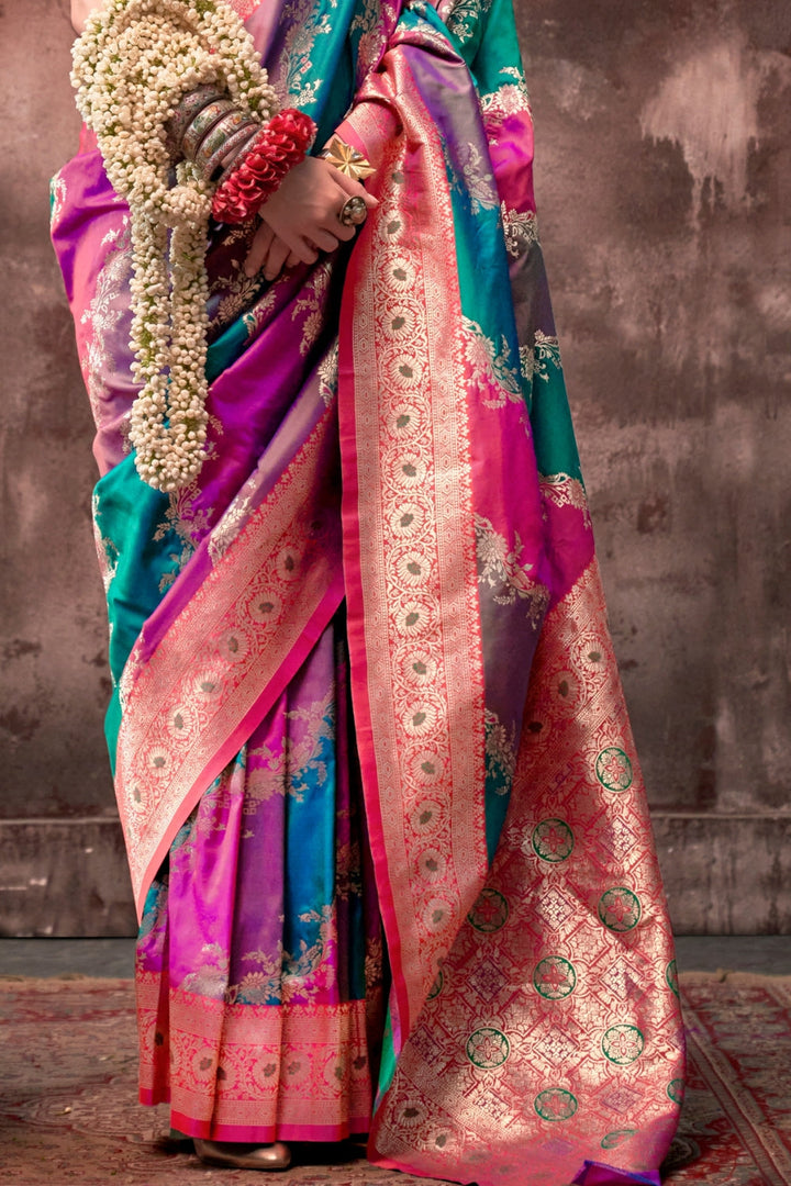 Fuchsia and Teal Blue Rangkaat silk saree with temple borders, intricate zari pallu, and traditional wedding styling. Handloom drape perfect for bollywood functions and magazine shoot, styled with mogra, antique jewelry, and regal stance. This image captures the side angle view showcasing blouse styling and zari border detail, ideal for visualizing festive elegance, designer appeal, and modern styling inspiration. Perfect for online shoppers seeking detailed previews before purchase, enhancing saree visual 