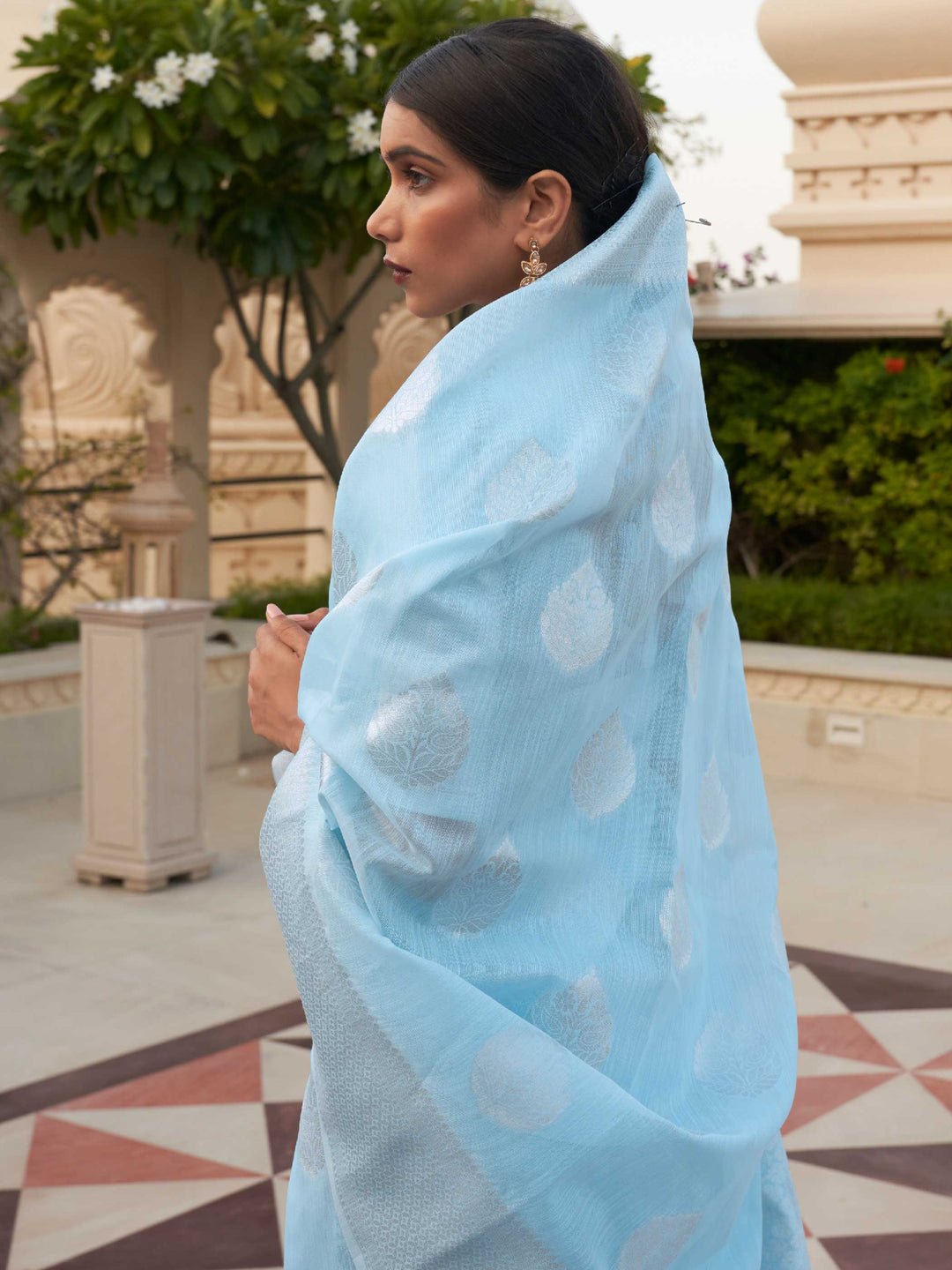 This Powder Blue–Silver Linen saree features refined woven floral motifs, perfect for haldi mornings, pooja rituals, and cultural celebrations. Crafted for breathable elegance and timeless grace. SKU 216001. This Powder Blue–Silver Linen saree features refined woven floral motifs, perfect for haldi mornings, pooja rituals, and cultural celebrations. Crafted for breathable elegance and timeless grace. SKU 216001.