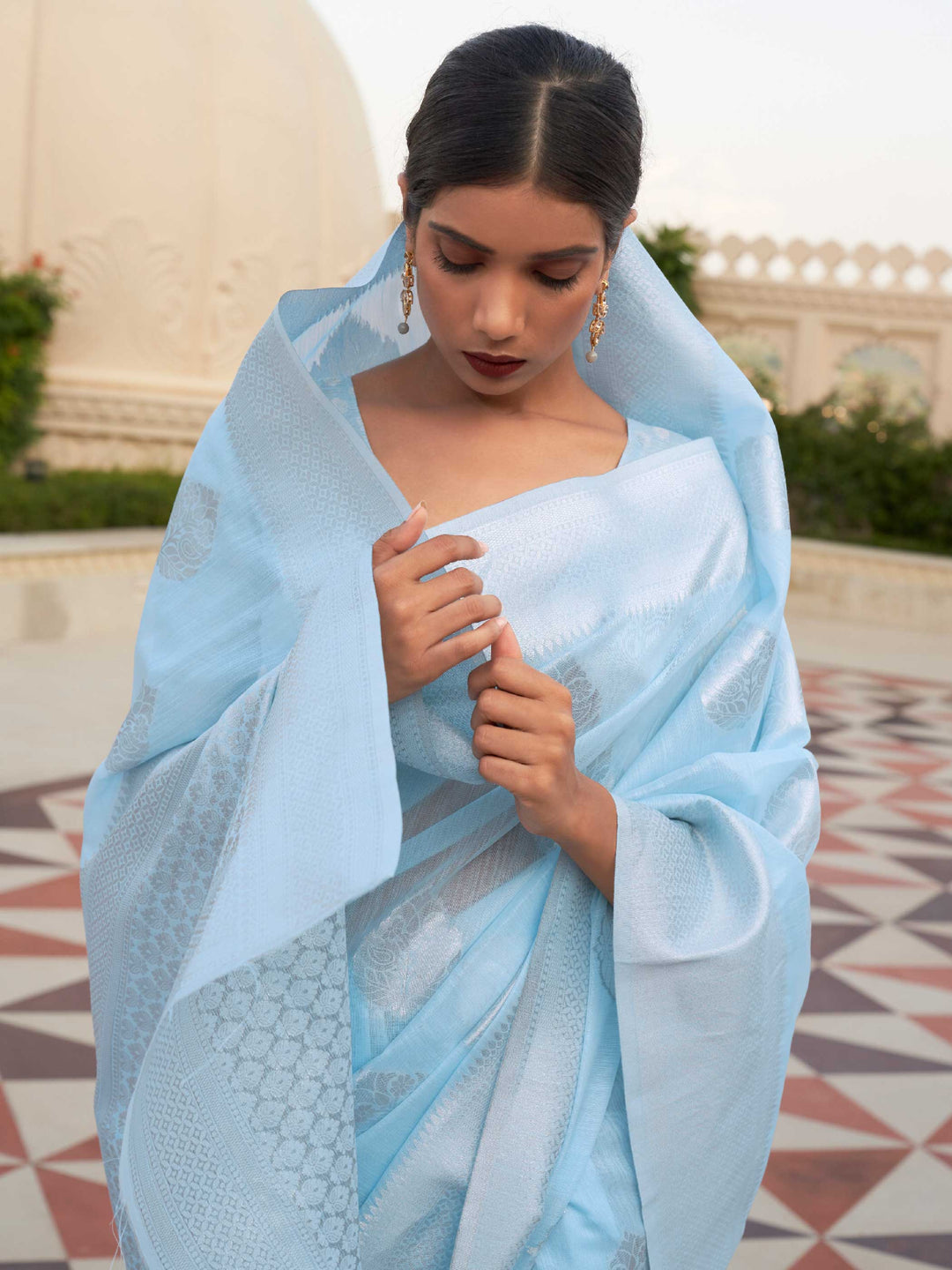 This Powder Blue–Silver Linen saree features refined woven floral motifs, perfect for haldi mornings, pooja rituals, and cultural celebrations. Crafted for breathable elegance and timeless grace. SKU 216001. This Powder Blue–Silver Linen saree features refined woven floral motifs, perfect for haldi mornings, pooja rituals, and cultural celebrations. Crafted for breathable elegance and timeless grace. SKU 216001.