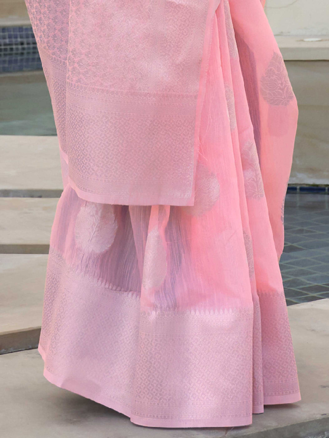 This Blush Pink–Silver Linen saree features refined woven floral motifs, perfect for haldi mornings, pooja rituals, and cultural celebrations. Crafted for breathable elegance and timeless grace. SKU 216002. This Blush Pink–Silver Linen saree features refined woven floral motifs, perfect for haldi mornings, pooja rituals, and cultural celebrations. Crafted for breathable elegance and timeless grace. SKU 216002.