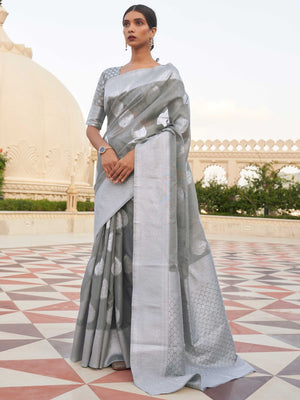 This Ash Grey–Silver Linen saree features refined woven floral motifs, perfect for haldi mornings, pooja rituals, and cultural celebrations. Crafted for breathable elegance and timeless grace. SKU 216003. This Ash Grey–Silver Linen saree features refined woven floral motifs, perfect for haldi mornings, pooja rituals, and cultural celebrations. Crafted for breathable elegance and timeless grace. SKU 216003.