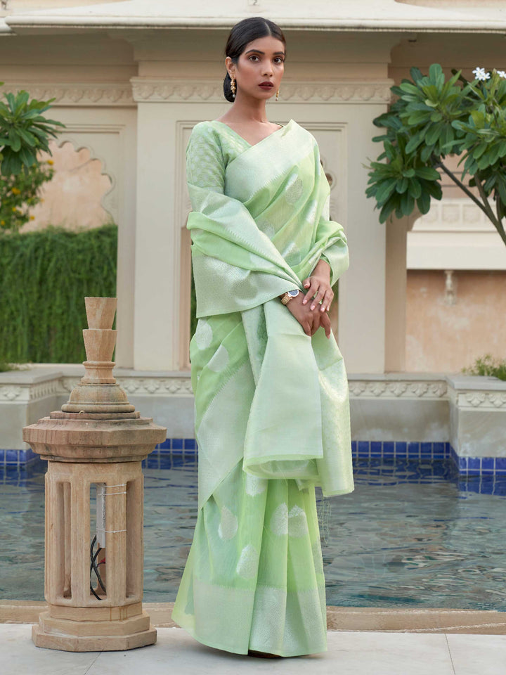 This Pista Green–Silver Linen saree features refined woven floral motifs, perfect for haldi mornings, pooja rituals, and cultural celebrations. Crafted for breathable elegance and timeless grace. SKU 216004. This Pista Green–Silver Linen saree features refined woven floral motifs, perfect for haldi mornings, pooja rituals, and cultural celebrations. Crafted for breathable elegance and timeless grace. SKU 216004.