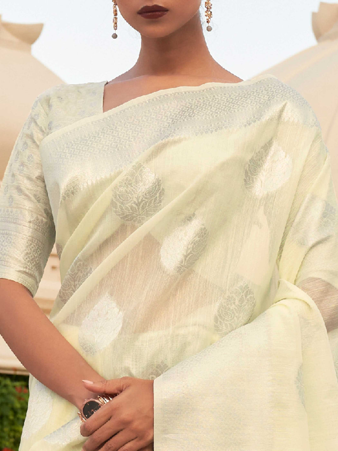 This Ivory White–Silver Linen saree features refined woven floral motifs, perfect for haldi mornings, pooja rituals, and cultural celebrations. Crafted for breathable elegance and timeless grace. SKU 216006. This Ivory White–Silver Linen saree features refined woven floral motifs, perfect for haldi mornings, pooja rituals, and cultural celebrations. Crafted for breathable elegance and timeless grace. SKU 216006.