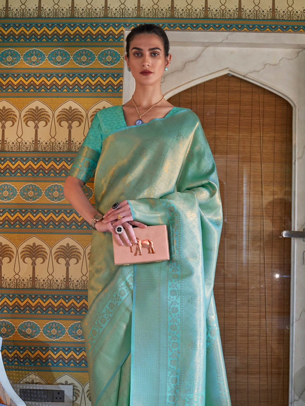 Soft Mint Green–Gold drape with traditional zari border, jacquard weave and blouse piece. Classic Indian festive silk saree in Mint Green–Gold with woven motifs for poojas and haldi.