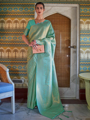 Mint Green–Gold silk saree with woven zari motifs and kanjivaram texture, ideal for weddings. Elegant Mint Green–Gold kanjivaram silk saree featuring gold/silver threadwork and festive pallu.