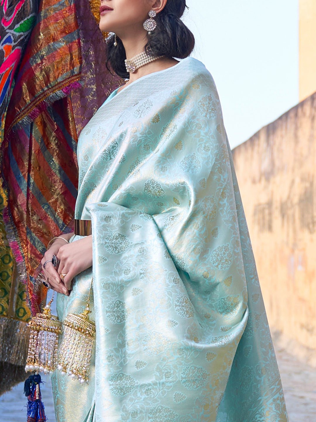 Mint Blue–Gold woven saree with luxurious detailing, perfect for wedding occasions. Festive kanjivaram drape in Mint Blue–Gold silk, styled with zari pallu and ethnic borders.