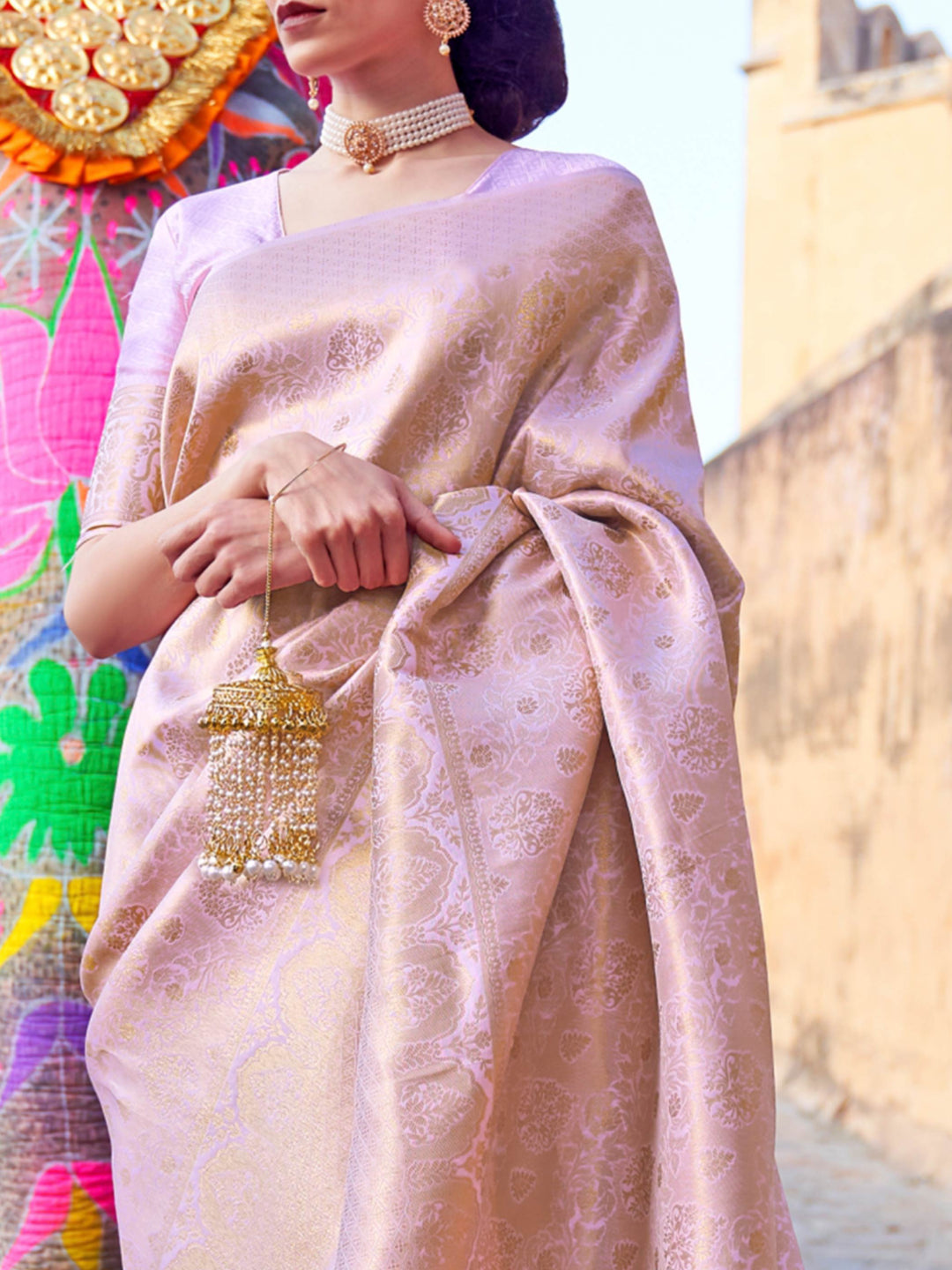 Beige–Gold woven saree with luxurious detailing, perfect for wedding occasions. Festive kanjivaram drape in Beige–Gold silk, styled with zari pallu and ethnic borders.