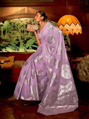 This Lilac Lavender–Silver Organza saree features subtle silver woven detailing for a dreamy, feather-light silhouette ideal for receptions, photoshoots, and elegant gatherings. Designed for lightness, movement, and soft glamour. SKU 255005. This Lilac Lavender–Silver Organza saree features subtle silver woven detailing for a dreamy, feather-light silhouette ideal for receptions, photoshoots, and elegant gatherings. Designed for lightness, movement, and soft glamour. SKU 255005.