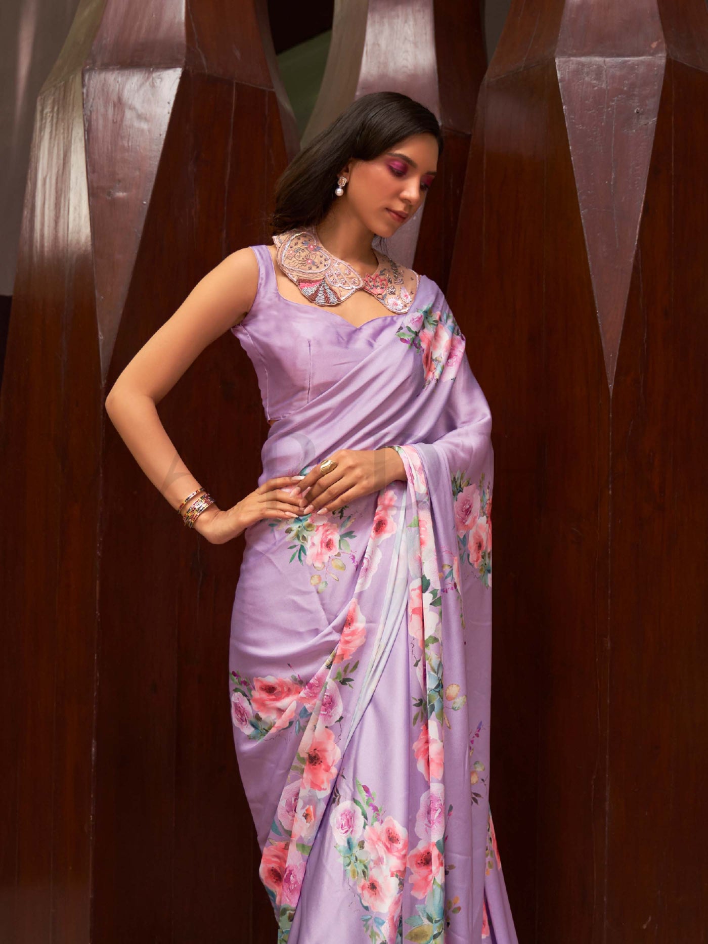 This Lavender–Blush Satin Crepe saree showcases stunning digital floral print that enhances its party-ready drape. Digitally crafted floral elegance for day-to-night ethnic wear. SKU 260003. This Lavender–Blush Satin Crepe saree showcases stunning digital floral print that enhances its party-ready drape. Digitally crafted floral elegance for day-to-night ethnic wear. SKU 260003.