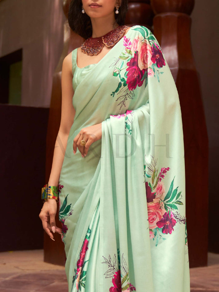 This Mint Green–Fuchsia Satin Crepe saree showcases stunning digital floral print that enhances its party-ready drape. Digitally crafted floral elegance for day-to-night ethnic wear. SKU 260005. This Mint Green–Fuchsia Satin Crepe saree showcases stunning digital floral print that enhances its party-ready drape. Digitally crafted floral elegance for day-to-night ethnic wear. SKU 260005.