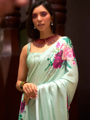This Mint Green–Fuchsia Satin Crepe saree showcases stunning digital floral print that enhances its party-ready drape. Digitally crafted floral elegance for day-to-night ethnic wear. SKU 260005. This Mint Green–Fuchsia Satin Crepe saree showcases stunning digital floral print that enhances its party-ready drape. Digitally crafted floral elegance for day-to-night ethnic wear. SKU 260005.