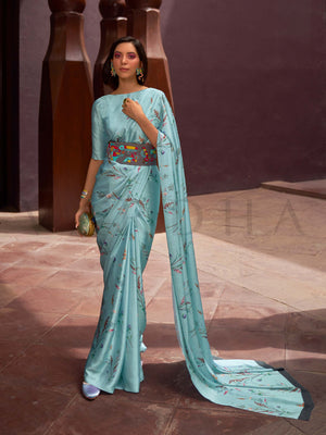 This Ice Blue–Multi Satin Crepe saree showcases stunning digital floral print that enhances its party-ready drape. Digitally crafted floral elegance for day-to-night ethnic wear. SKU 260006. This Ice Blue–Multi Satin Crepe saree showcases stunning digital floral print that enhances its party-ready drape. Digitally crafted floral elegance for day-to-night ethnic wear. SKU 260006.