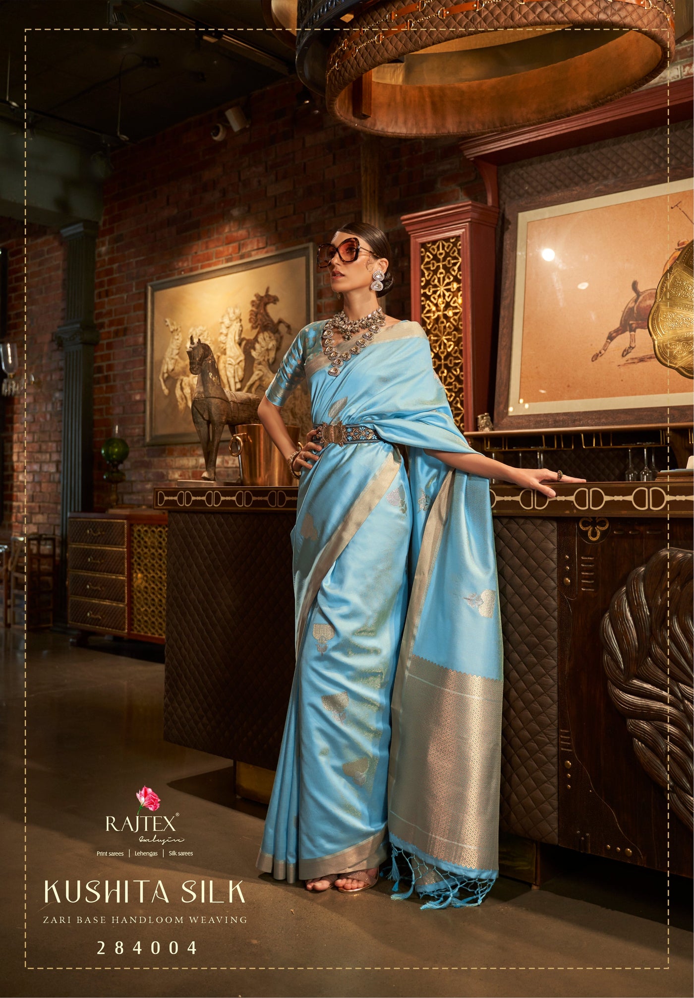 This Sky Blue–Silver Satin Silk saree features ornate zari woven detailing, making it ideal for receptions, festive nights, and luxurious occasions. Flowing drape, royal touch, and timeless appeal. SKU 284004. This Sky Blue–Silver Satin Silk saree features ornate zari woven detailing, making it ideal for receptions, festive nights, and luxurious occasions. Flowing drape, royal touch, and timeless appeal. SKU 284004.
