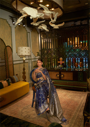 This Navy Blue–Silver Satin Silk saree features exquisite zari weave, designed for weddings, festive events, and cultural celebrations. Ideal for graceful draping and traditional styling. SKU 287004. This Navy Blue–Silver Satin Silk saree features exquisite zari weave, designed for weddings, festive events, and cultural celebrations. Ideal for graceful draping and traditional styling. SKU 287004.