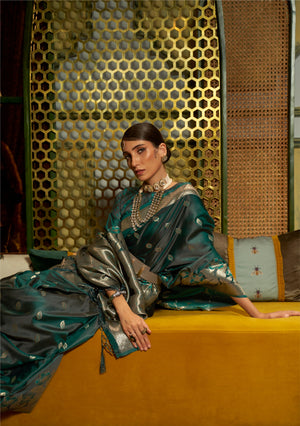 This Bottle Green–Silver Satin Silk saree features exquisite zari weave, designed for weddings, festive events, and cultural celebrations. Ideal for graceful draping and traditional styling. SKU 287005. This Bottle Green–Silver Satin Silk saree features exquisite zari weave, designed for weddings, festive events, and cultural celebrations. Ideal for graceful draping and traditional styling. SKU 287005.