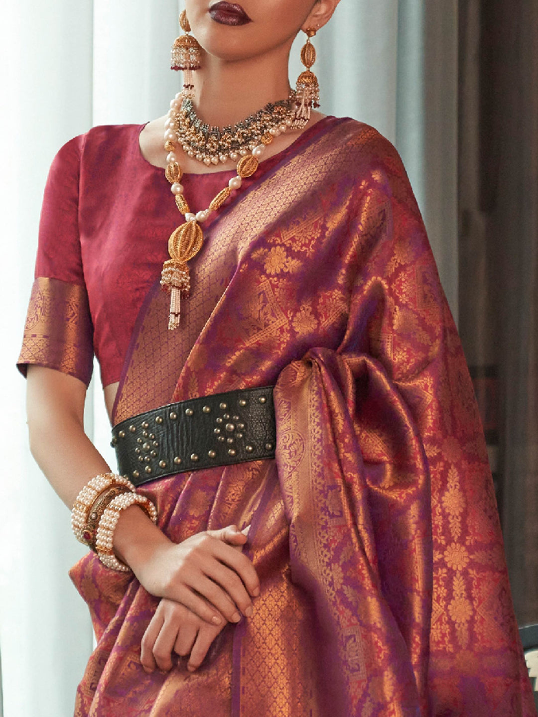 Royal kanjivaram silk saree in Maroon–Copper with traditional motifs and contrast blouse. Maroon–Copper wedding kanjivaram silk with soft zari sheen, heritage vibe, and jacquard elegance.