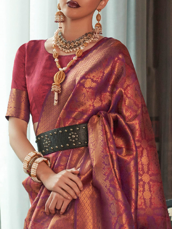 Royal kanjivaram silk saree in Maroon–Copper with traditional motifs and contrast blouse. Maroon–Copper wedding kanjivaram silk with soft zari sheen, heritage vibe, and jacquard elegance.