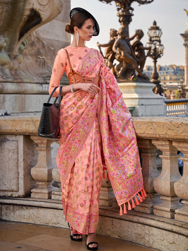 Blush Peach organza parsi silk saree with intricate multicolor thread floral embroidery and handloom craftsmanship, ideal for sangeet and styled perfectly for sister of the bride elegance and fashion-forward flair. This image captures the front drape view highlighting pallu fall and pleats alignment, ideal for visualizing festive elegance, designer appeal, and modern styling inspiration. Perfect for online shoppers seeking detailed previews before purchase, enhancing saree visual merchandising and SEO-rich 