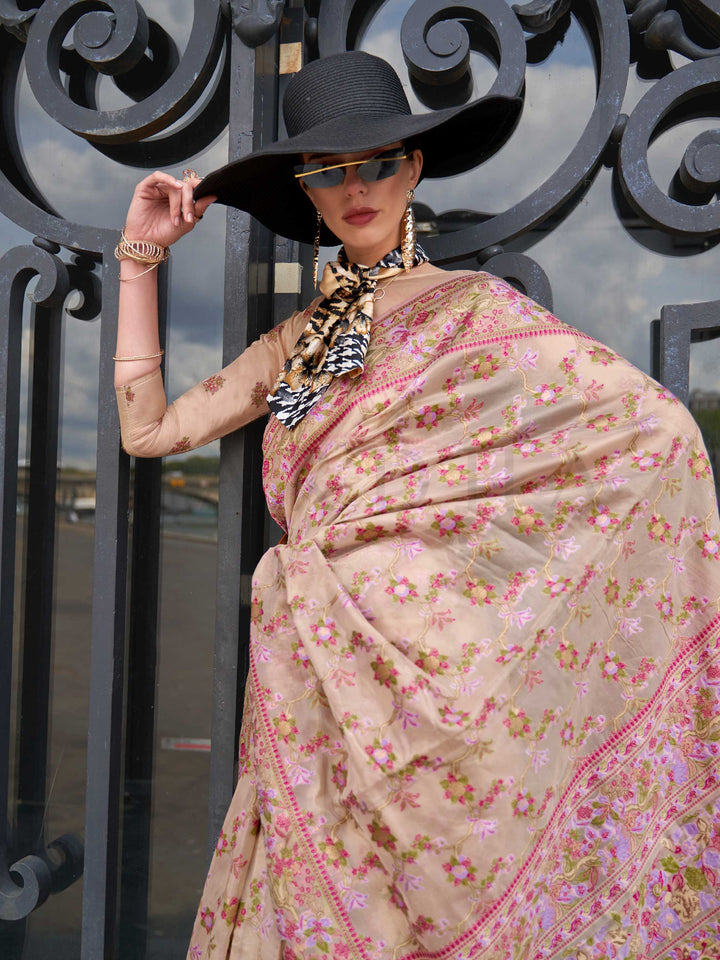 Champagne Beige organza parsi silk saree with intricate multicolor thread floral embroidery and handloom craftsmanship, ideal for wedding and styled perfectly for reception glam elegance and fashion-forward flair. This image captures the model styling perspective with complete saree ensemble displayed, ideal for visualizing festive elegance, designer appeal, and modern styling inspiration. Perfect for online shoppers seeking detailed previews before purchase, enhancing saree visual merchandising and SEO-ric