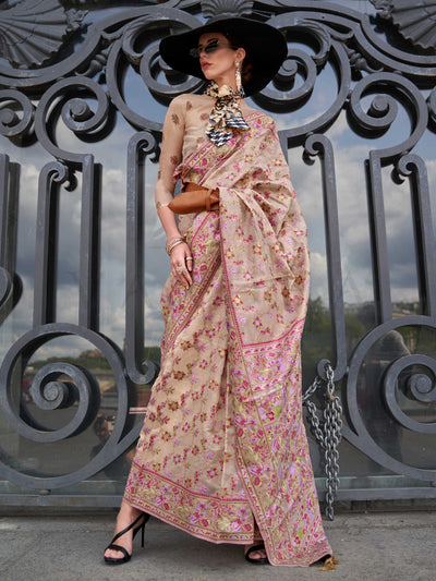 Champagne Beige organza parsi silk saree with intricate multicolor thread floral embroidery and handloom craftsmanship, ideal for wedding and styled perfectly for reception glam elegance and fashion-forward flair. This image captures the front drape view highlighting pallu fall and pleats alignment, ideal for visualizing festive elegance, designer appeal, and modern styling inspiration. Perfect for online shoppers seeking detailed previews before purchase, enhancing saree visual merchandising and SEO-rich p
