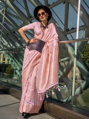Blush Nude Katan silk saree with Ivory zari detailing, featuring checks handloom weaving, designer blouse and tasselled pallu — a perfect fit for party-wear and anniversary glam. Styled with modern belts, hats, and accessories to blend heritage and couture elegance. This image captures the front drape view highlighting pallu fall and pleats alignment, ideal for visualizing festive elegance, designer appeal, and modern styling inspiration. Perfect for online shoppers seeking detailed previews before purchase