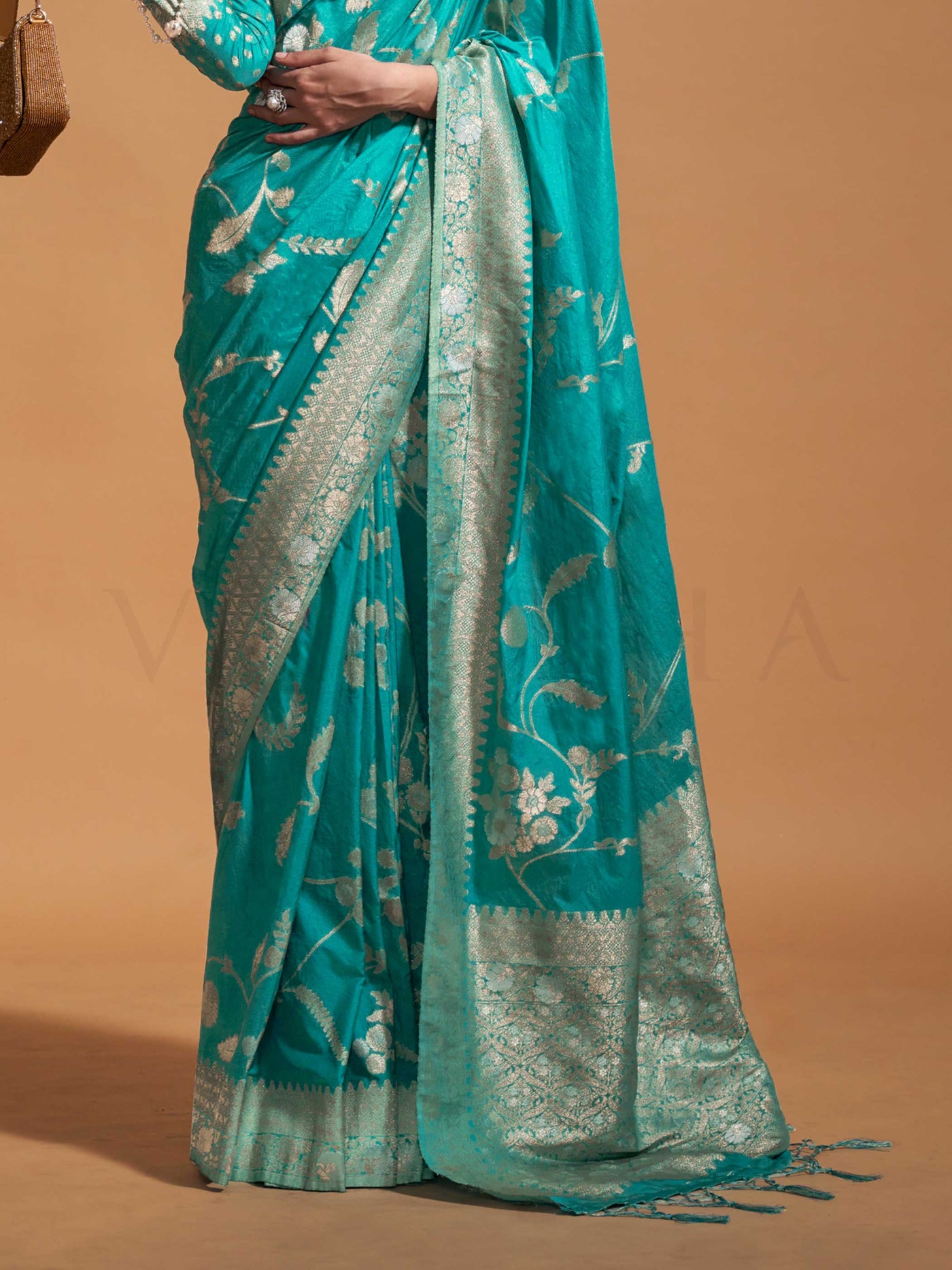 Turquoise Blue Georgette Handloom Saree with Gold Zari Detailing