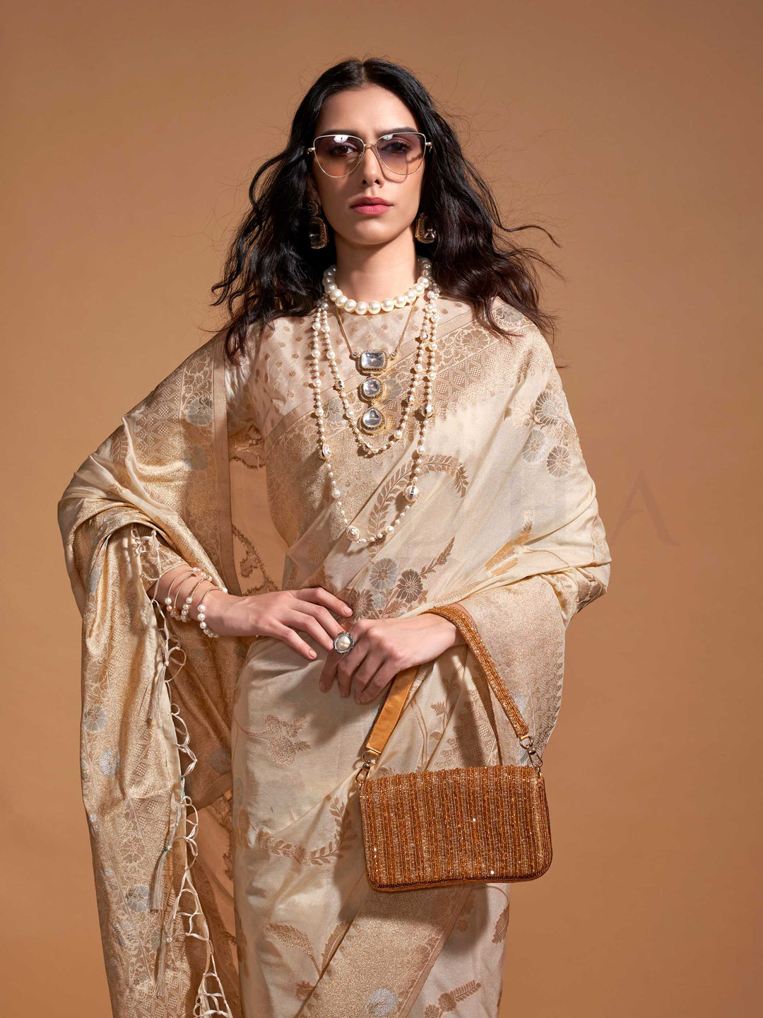 Ideal for weddings, festive occasions, and sangeet nights, this saree embodies luxury in every thread