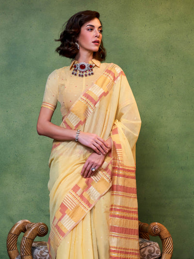 Lemon Yellow–Rust festive saree featuring woven checks, tassel finish, and soft pastel elegance. Pastel Lemon Yellow–Rust cotton saree for cultural daywear with minimalistic woven detailing.