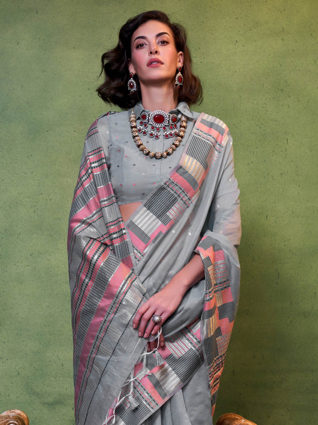 Dusty Blue–Rose festive saree featuring woven checks, tassel finish, and soft pastel elegance. Pastel Dusty Blue–Rose cotton saree for cultural daywear with minimalistic woven detailing.