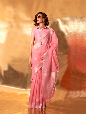 Rose pink linen cotton saree with silver woven floral pallu, perfect for festive daytime elegance. Soft rose saree in linen cotton featuring silver motifs and jacquard border, styled for brunch.