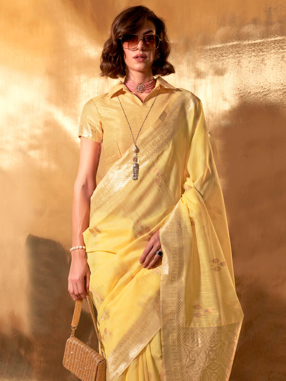Lemon Yellow–Gold festive-ready saree with breathable fall and floral border accents. Chic pastel linen saree in Lemon Yellow–Gold with floral woven design for daytime events.