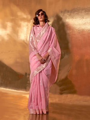 Baby Pink–Silver linen cotton saree with woven floral border and silver/golden pallu design. Soft Baby Pink–Silver saree in linen cotton featuring elegant woven motifs and jacquard styling.