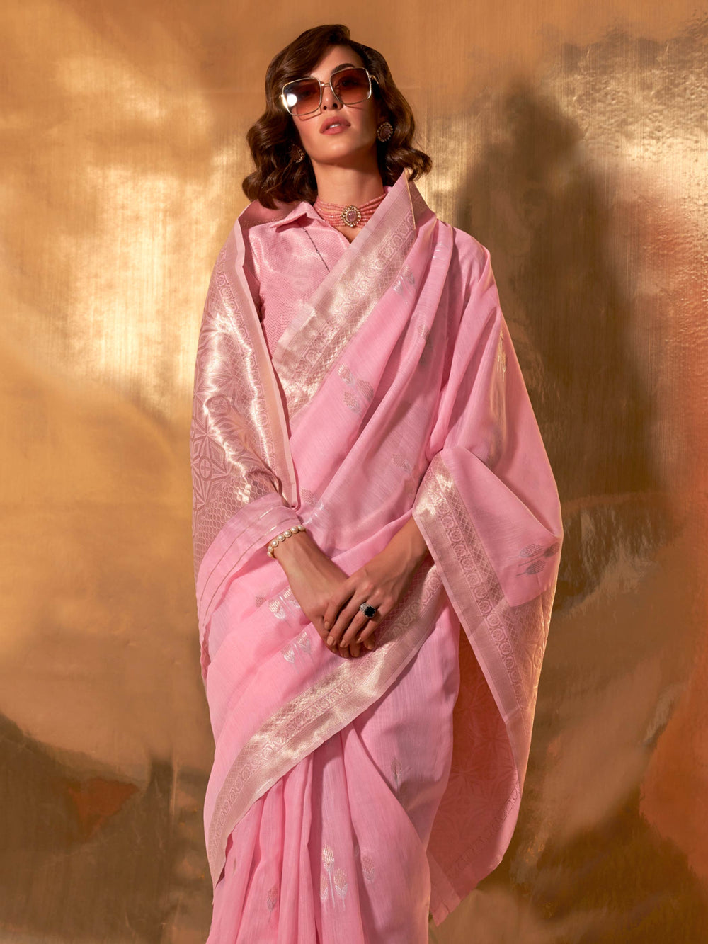 Baby Pink–Silver festive-ready saree with breathable fall and floral border accents. Chic pastel linen saree in Baby Pink–Silver with floral woven design for daytime events.