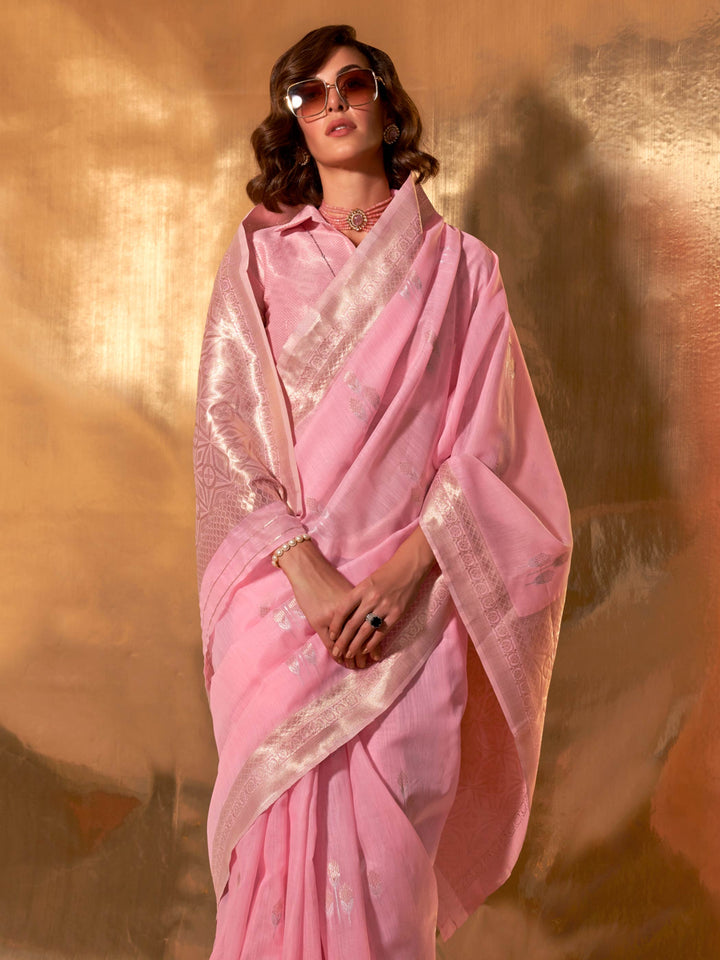 Baby Pink–Silver festive-ready saree with breathable fall and floral border accents. Chic pastel linen saree in Baby Pink–Silver with floral woven design for daytime events.