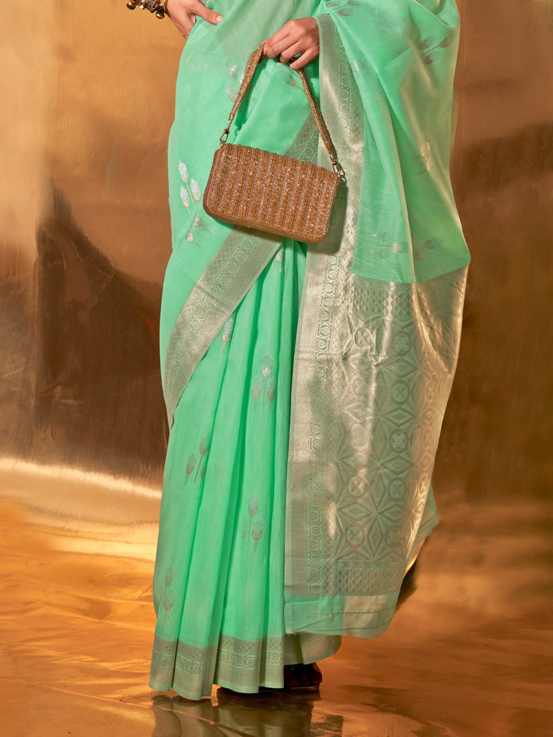 Sea Green–Silver linen cotton saree perfect for mehendi, pooja or engagement festivities. Classic Sea Green–Silver saree with light zari accents and contrast blouse suggestion.