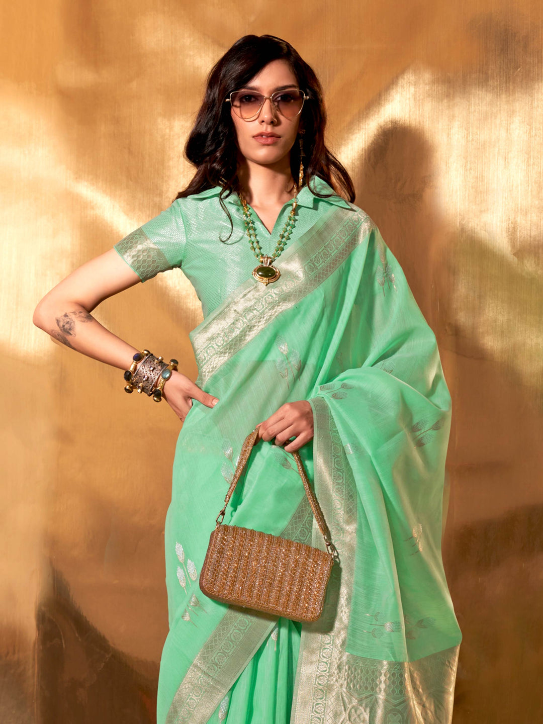 Sea Green–Silver festive-ready saree with breathable fall and floral border accents. Chic pastel linen saree in Sea Green–Silver with floral woven design for daytime events.